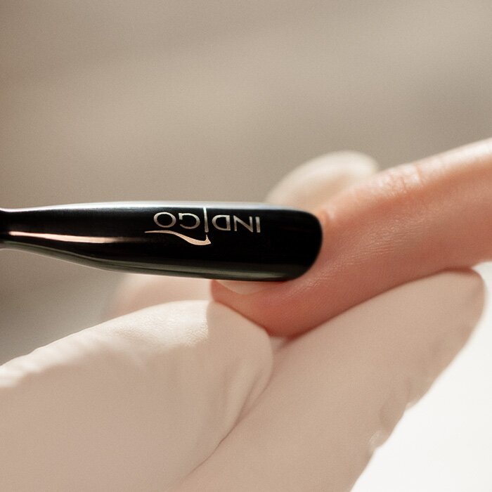 Double-ended cuticle pusher made of stainless steel